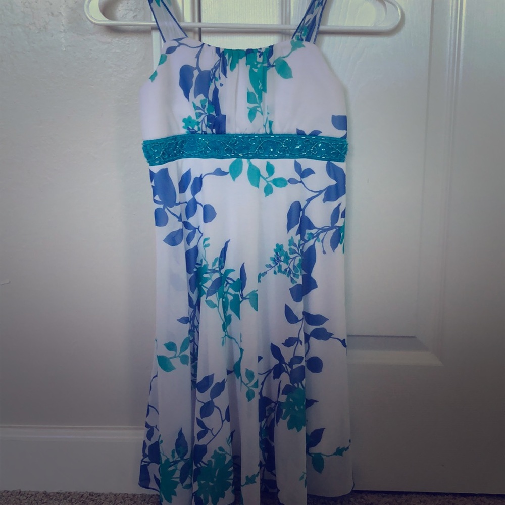 A blue, teal and white floral dress